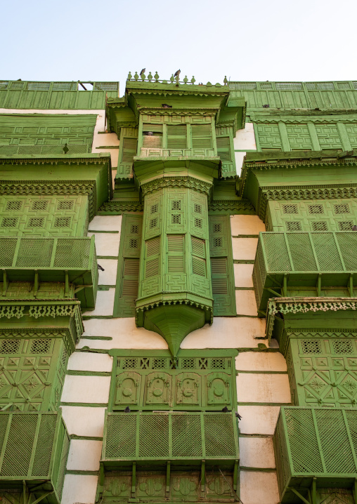 Old house with green wooden mashrabiya in al-Balad quarter, Mecca province, Jeddah, Saudi Arabia