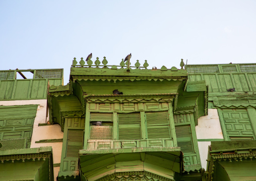 Old house with green wooden mashrabiya in al-Balad quarter, Mecca province, Jeddah, Saudi Arabia