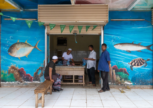 Farasani men in the fish market, Red Sea, Farasan, Saudi Arabia