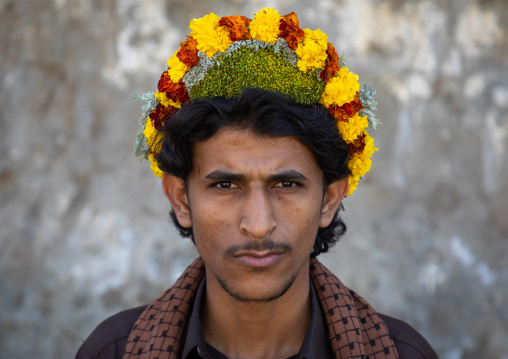 Portrait of a flower man wearing a floral crown on the head, Jizan Province, Addayer, Saudi Arabia