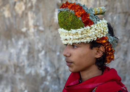 Portrait of a flower boy wearing a floral crown on the head, Jizan Province, Addayer, Saudi Arabia