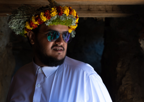 Portrait of a flower man wearing a floral crown on the head, Jizan Province, Addayer, Saudi Arabia