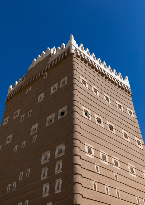 Traditional old mud house against blue sky, Najran Province, Najran, Saudi Arabia