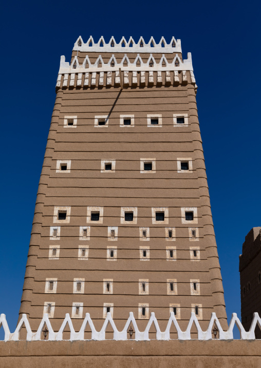 Traditional old mud house against blue sky, Najran Province, Najran, Saudi Arabia