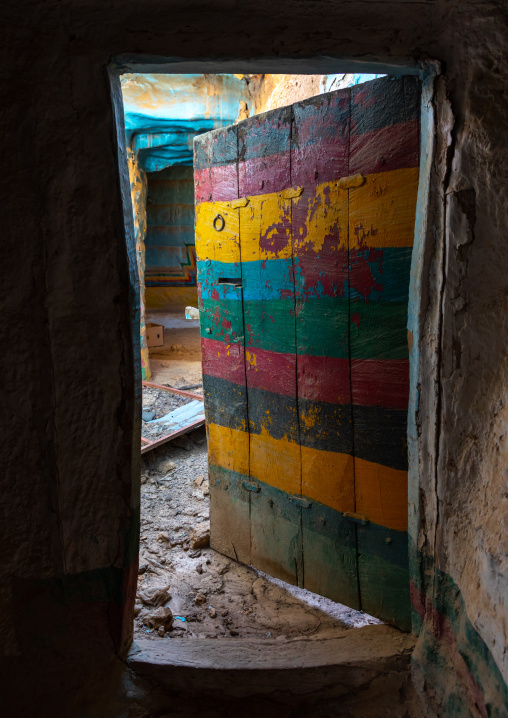 Colorful wooden door of an abandonned asiri house, Asir province, Sarat Abidah, Saudi Arabia