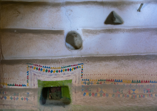 Al-qatt al-asiri traditionally female interior window decoration in an abandonned house, Asir province, Sarat Abidah, Saudi Arabia