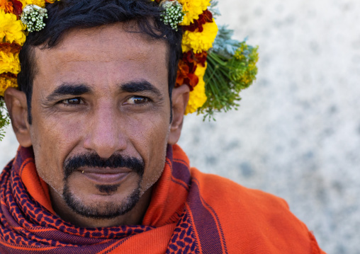 Portrait of a flower man wearing a floral crown on the head, Jizan Province, Addayer, Saudi Arabia