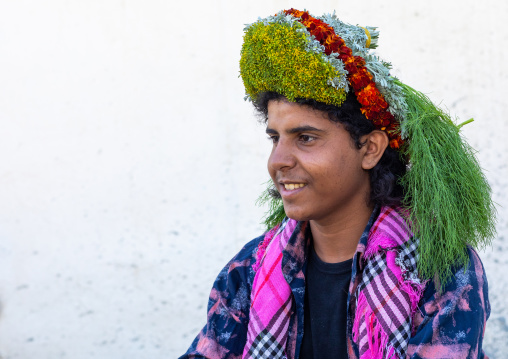 Portrait of a flower man wearing a floral crown on the head, Jizan Province, Addayer, Saudi Arabia