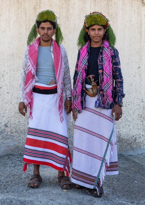 Portrait of flower men wearing floral crowns on the heads, Jizan Province, Addayer, Saudi Arabia