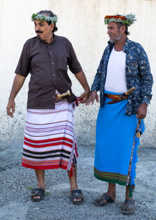 Portrait of flower men wearing floral crowns on the heads, Jizan Province, Addayer, Saudi Arabia