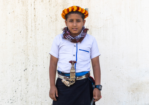 Portrait of a flower boy wearing a floral crown on the head, Jizan Province, Addayer, Saudi Arabia