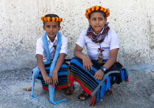 Portrait of flower boys wearing floral crowns on the heads, Jizan Province, Addayer, Saudi Arabia