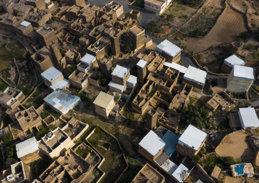 Aerial view of stone and mud houses with slates in al Khalaf village, Asir province, Sarat Abidah, Saudi Arabia