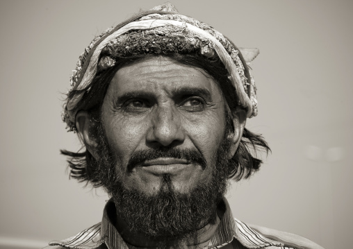 Portrait of a flower man wearing a floral crown on the head, Jizan province, Addayer, Saudi Arabia