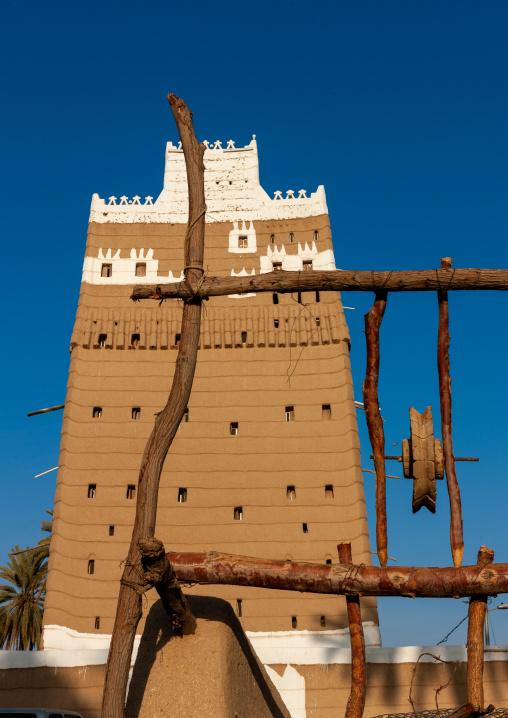 Well in front of a traditional mud-bricks house, Najran Province, Najran, Saudi Arabia