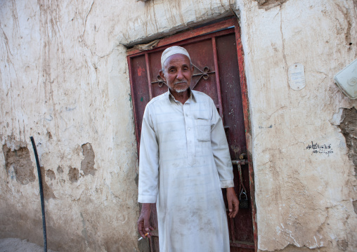 Saudi man smoking in the street, Najran Province, Najran, Saudi Arabia