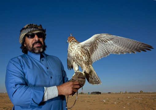 Falconry in the desert, Al-Jawf Province, Sakaka, Saudi Arabia