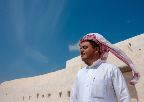 Saudi man in qal at al-atrak the ottoman castle, Jizan Region, Farasan island, Saudi Arabia