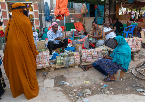 Wads of money changer on his stall 
, Woqooyi Galbeed region, Hargeisa, Somaliland