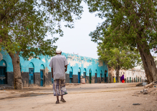 Old somali man walking in the streets of the old town, Sahil region, Berbera, Somaliland