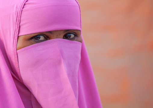 Portrait of a somali woman wearing a pink niqab, Woqooyi Galbeed region, Hargeisa, Somaliland