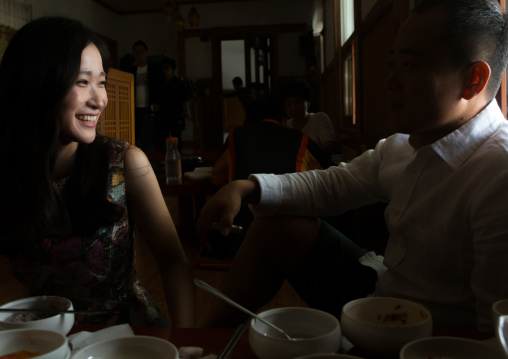 North korean defector joseph park eating at restaurant with his south korean fiancee juyeon, National capital area, Seoul, South korea