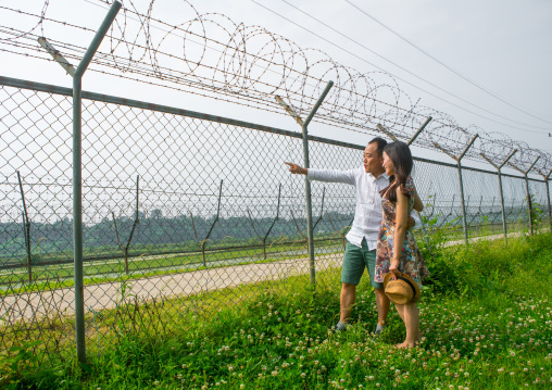 North korean defector joseph park with his south korean fiancee juyeon on the north and south korea border, Sudogwon, Paju, South korea