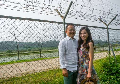 North korean defector joseph park with his south korean fiancee juyeon on the north and south korea border, Sudogwon, Paju, South korea