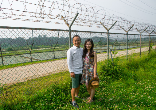 North korean defector joseph park with his south korean fiancee juyeon on the north and south korea border, Sudogwon, Paju, South korea