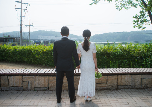 North korean defector joseph park with his south korean fiancee juyeon on the north and south korea border, Sudogwon, Paju, South korea