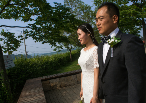 North korean defector joseph park with his south korean fiancee juyeon on the north and south korea border, Sudogwon, Paju, South korea