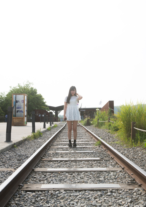 South korean young woman on the north and south korea border, Sudogwon, Paju, South korea