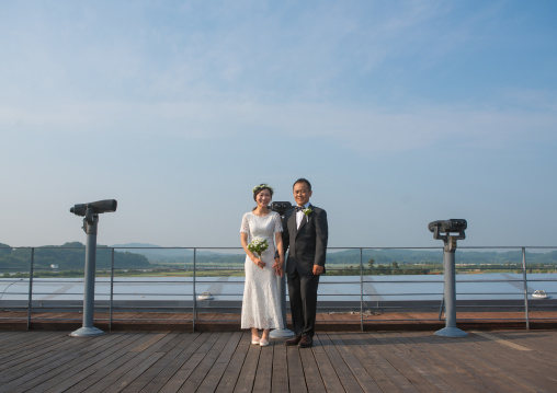 North korean defector joseph park with his south korean fiancee juyeon on the north and south korea border, Sudogwon, Paju, South korea