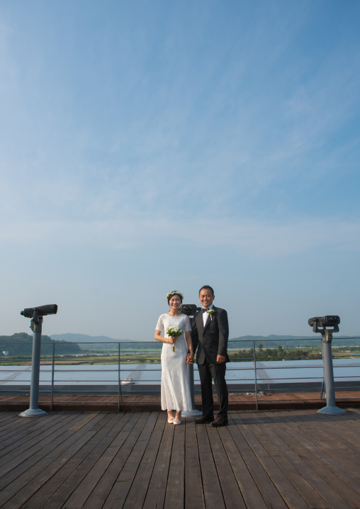 North korean defector joseph park with his south korean fiancee juyeon on the north and south korea border, Sudogwon, Paju, South korea