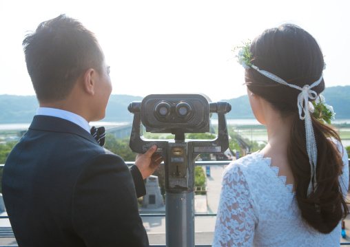 North korean defector joseph park with his south korean fiancee juyeon on the north and south korea border, Sudogwon, Paju, South korea