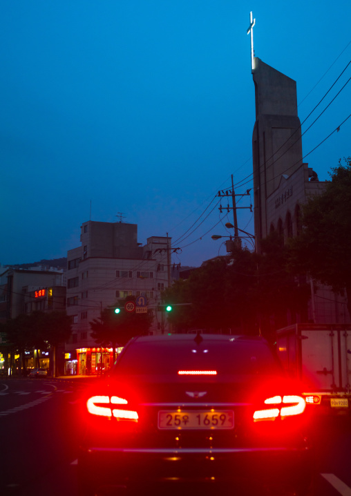 Car passing in front of a church, National capital area, Seoul, South korea