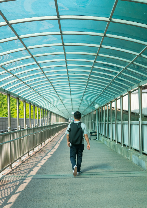 North korean defector joseph park coming back nine years after in yangcheong in a glass corridor, National capital area, Seoul, South korea