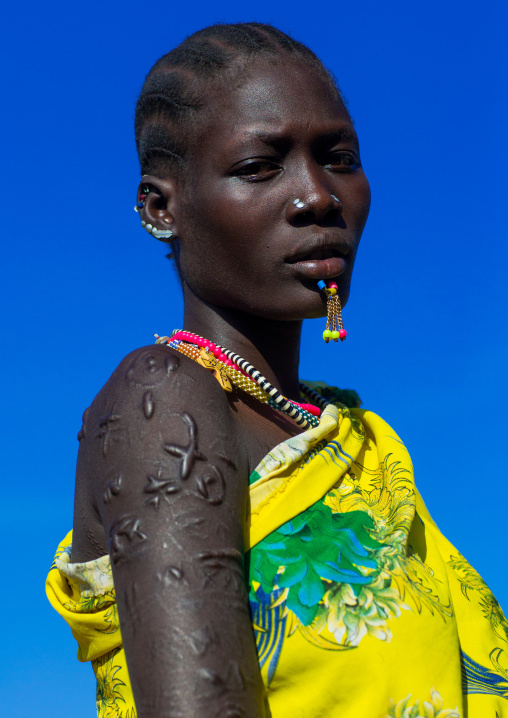 Larim tribe woman with scarifications on her body, Boya Mountains, Imatong, South Sudan