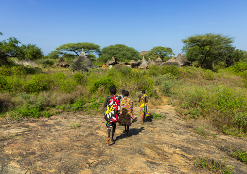 Larim tribe girls coming to theit village, Boya Mountains, Imatong, South Sudan