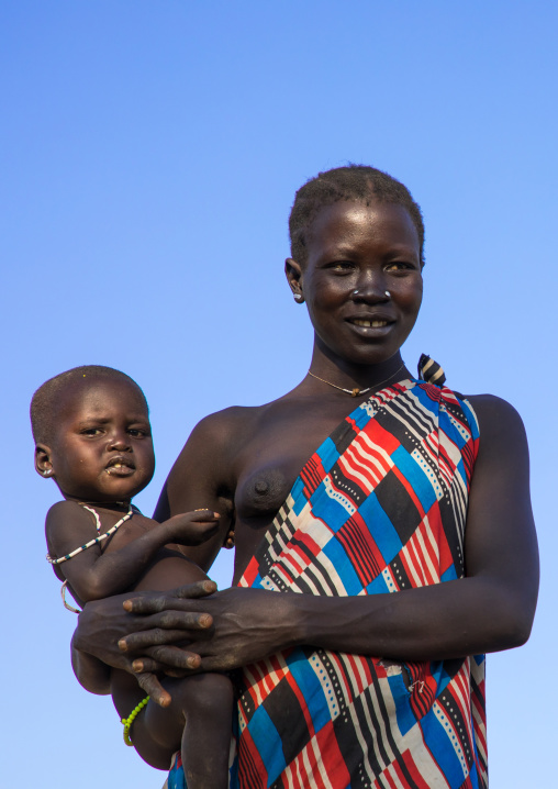 Larim tribe woman carrying her baby, Boya Mountains, Imatong, South Sudan