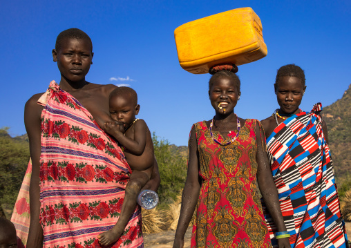 Larim tribe women with colorful clothing, Boya Mountains, Imatong, South Sudan