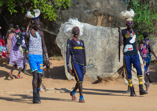 Larim tribe men dancing during a wedding ceremony, Boya Mountains, Imatong, South Sudan