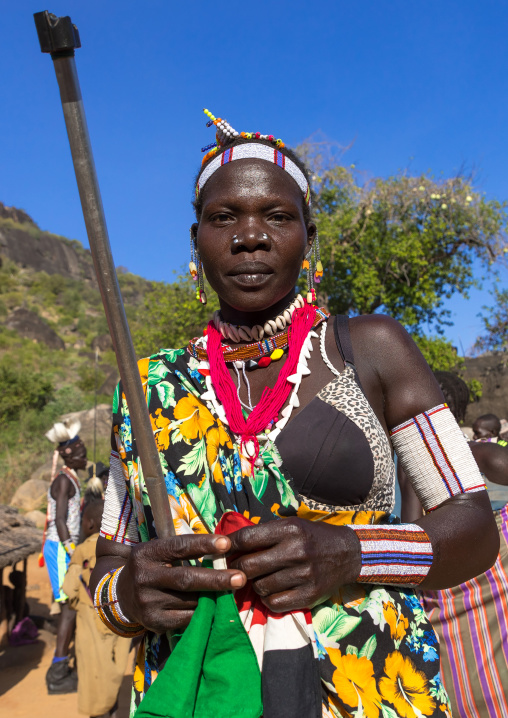 Larim tribe woman dancing during a wedding celebration, Boya Mountains, Imatong, South Sudan