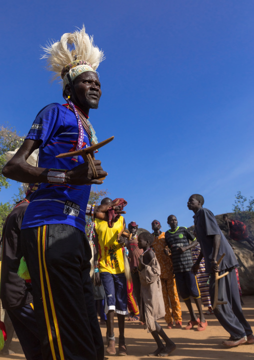 Larim tribe men dancing during a wedding ceremony, Boya Mountains, Imatong, South Sudan