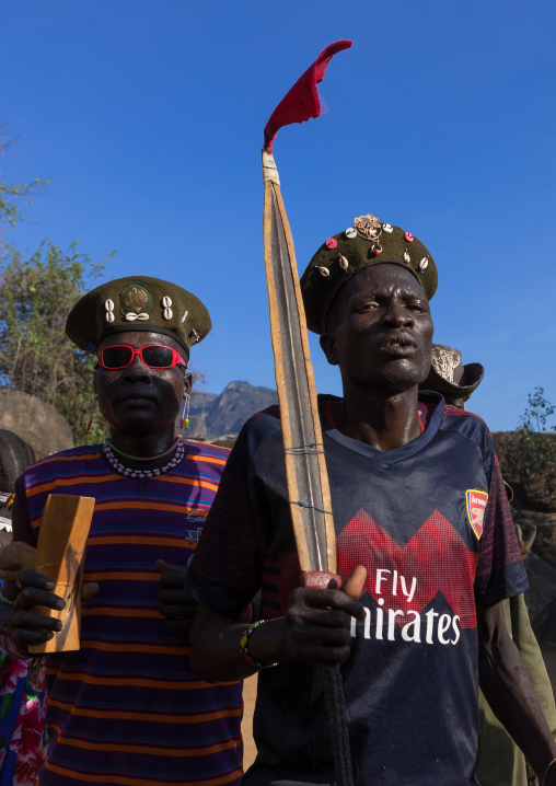 Larim tribe men dancing during a wedding ceremony, Boya Mountains, Imatong, South Sudan