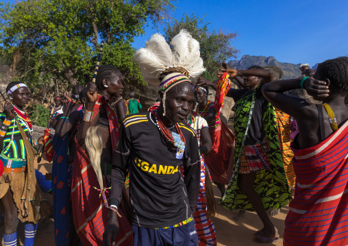 Larim tribe men dancing during a wedding ceremony, Boya Mountains, Imatong, South Sudan