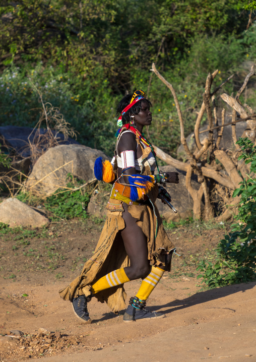 Larim tribe woman dancing during a wedding celebration, Boya Mountains, Imatong, South Sudan