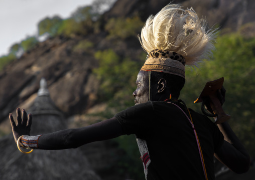 Larim tribe man dancing during a wedding ceremony, Boya Mountains, Imatong, South Sudan