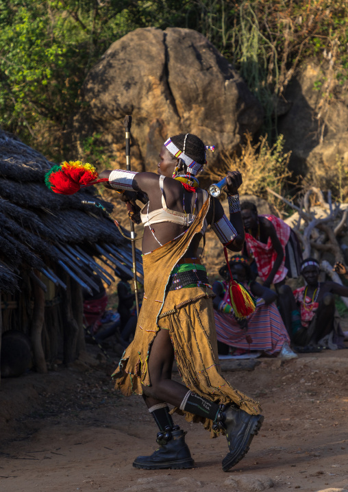 Larim tribe woman dancing during a wedding celebration, Boya Mountains, Imatong, South Sudan