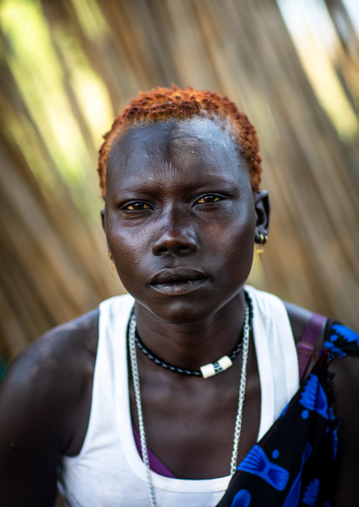 Portrait of a Mundari tribe man with hair dyed in orange with cow urine, Central Equatoria, Terekeka, South Sudan